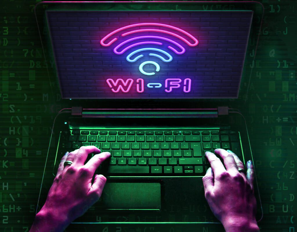 hack your own wi fi neon wi fi keyboard hacker 100791531 large.3x2 1024x800 - 10 تکنیک رایج هک کردن که باید بدانید تا هک نشوید